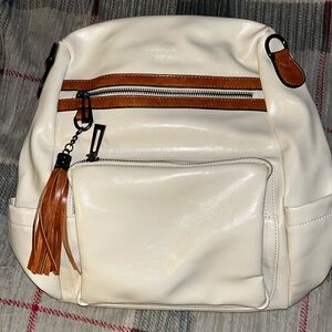 Cream colored Opage bag.
